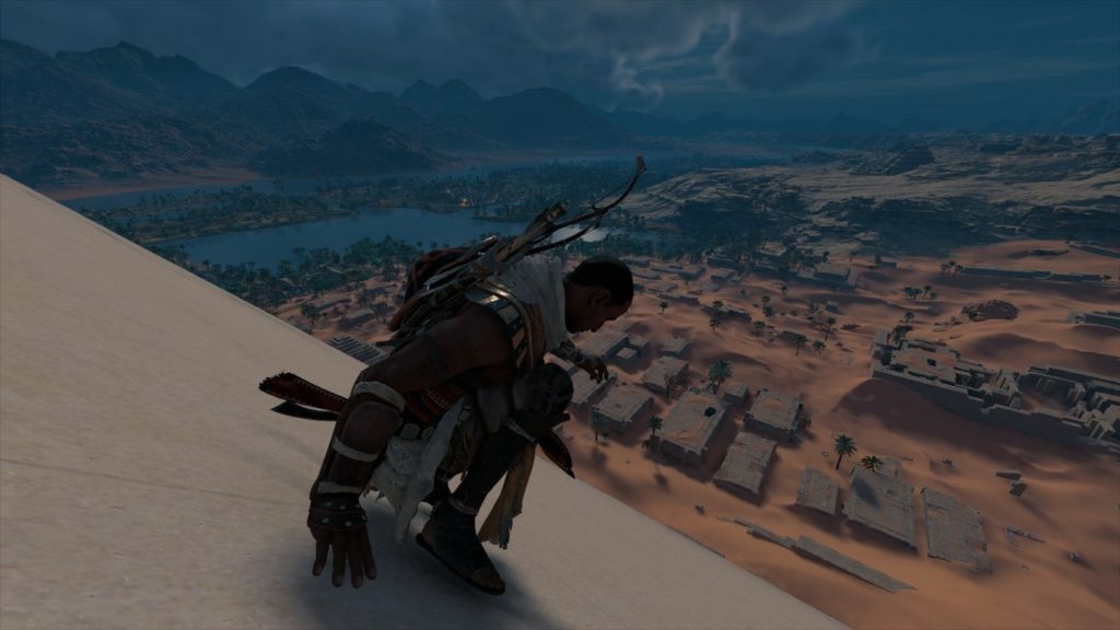 Image Description: Assassin's Creed: Origins - Bayek slides down a pyramid. End of Image Description.