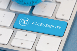 Image description: a promotional image for our accessibility audit inclusion services. It is a keyboard with a highlighted button, labelled "accessibility". End of image description.